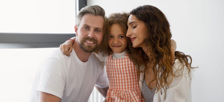 young girl adopted by couple scaled e1761214331462